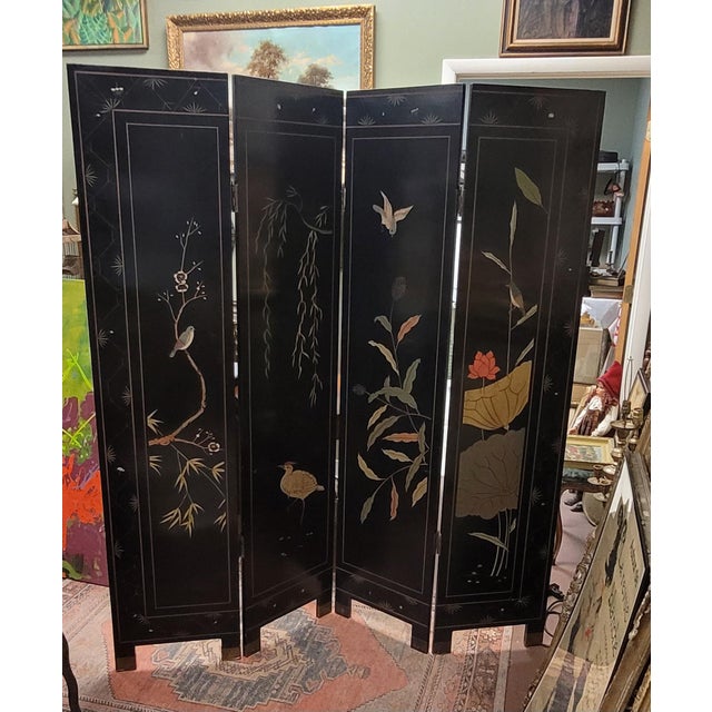 Beautiful vintage 1980s sculpted Chinese folding screen. Featuring birds foliage flowers Chinese high society life....