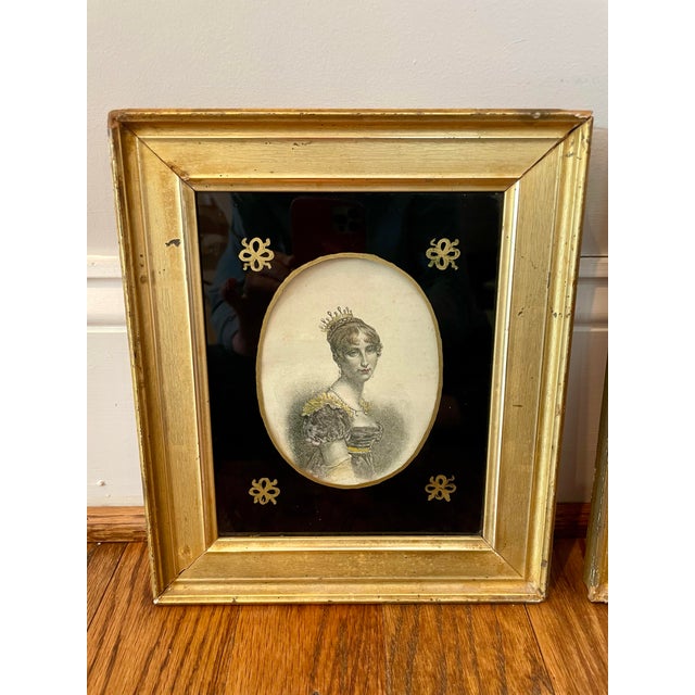 A pair of 19th century Napoleonic-era portrait engravings featuring hand-colored depictions of Hortense de Beauharnais,...