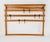 An elegant modernist wall-mounted coat rack from the 1950s. An original and old vintage object, designed and executed by...