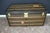 This beautiful Louis Vuitton trunk dates back to around 1920's. It features hand stenciled monogram canvas, black lozine...