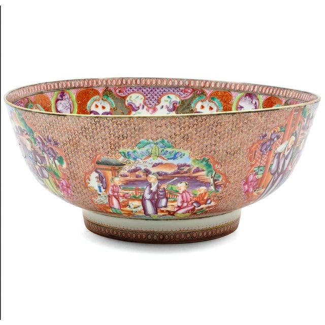 Chinese Export Mandarin Famille Rose Punch Bowl Qianlong Period, Circa 1780–1785 A large and richly decorated Chinese...