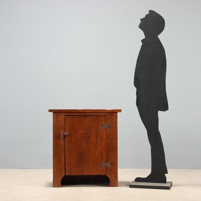 Small walnut credenza from the 19th century, crafted from antique woods, featuring a simple and functional design. The...