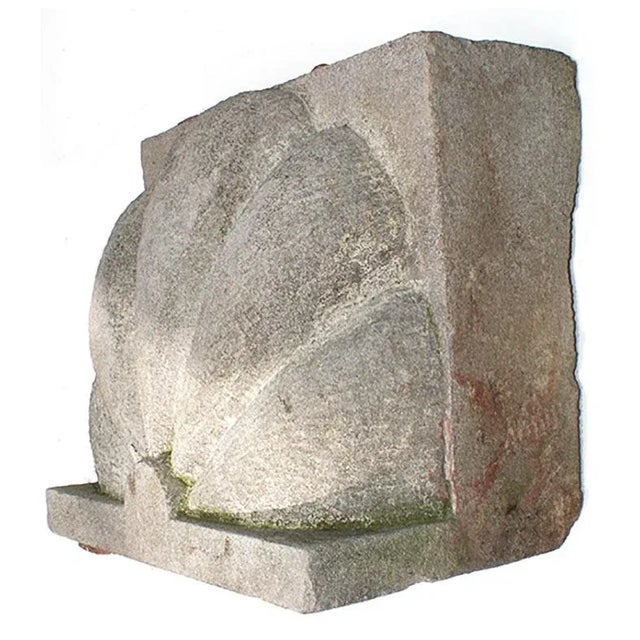 Antique early 20th century carved limestone scallop form building ornament.