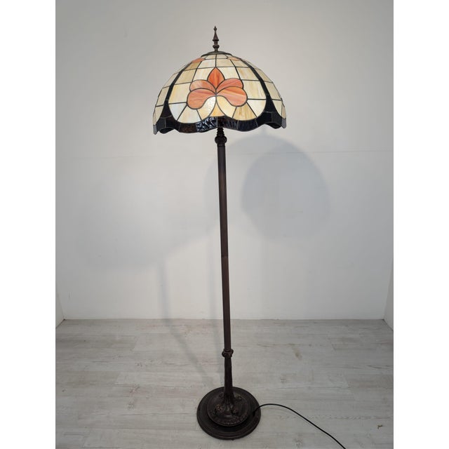 Tiffany Stained Glass Floor Lamp A beautiful, stylish Tiffany-style floor lamp. The shade is made of colorful stained...