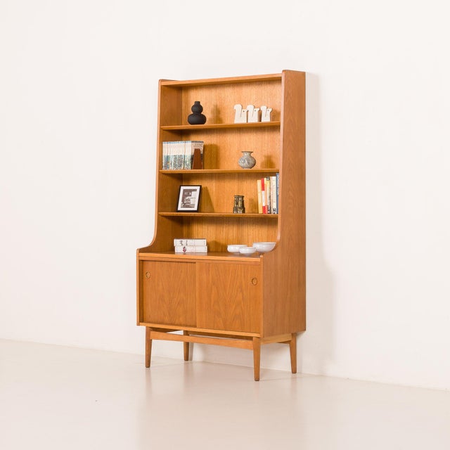 Unusual johannes sorth bookcase in oak. It was manufactured by nexo møbelfabrik in bornholm in the late 1950s or early...