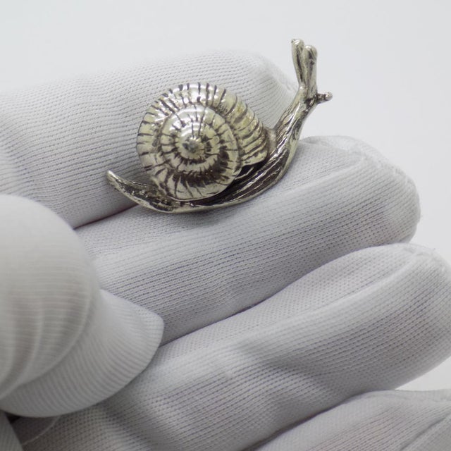 Vintage miniature sculpture with a naturalistic and realistic style, depicting a small life size snail, handmade in Italy...