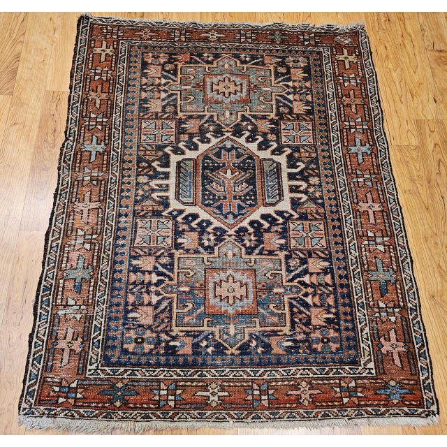 "A beautifully preserved antique Heriz Karajeh area rug, handwoven in Northwest Persia circa the late 1800s. This piece...