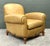 This iconic Ralph Lauren club chair is a masterclass in classic Deco-inspired luxury. Upholstered in a premium, honey-...