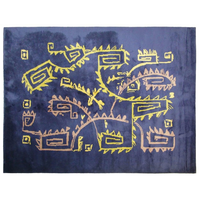 Handwoven in wool, this 10x13 vintage rug reflects the rich weaving traditions of the Andean highlands, likely originating...