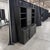 Pottery Barn Logan modular wall unit in black, a six-piece suite that assembles into a 72-inch-wide china cabinet,...