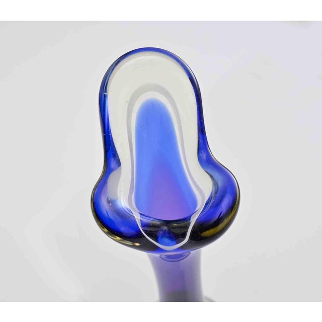 Vintage blue vase realized in the 70s by a European manufacture. 27,5 x 7,5 x 7,5 cm. Very Good condition