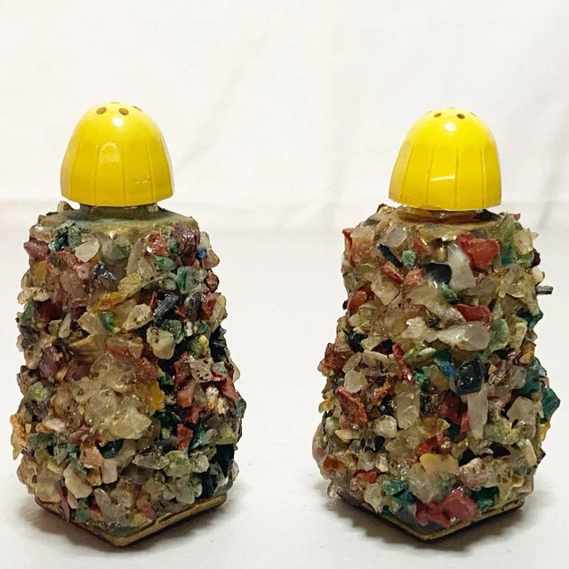 Beautiful multicolor stone covered salt and pepper shakers.