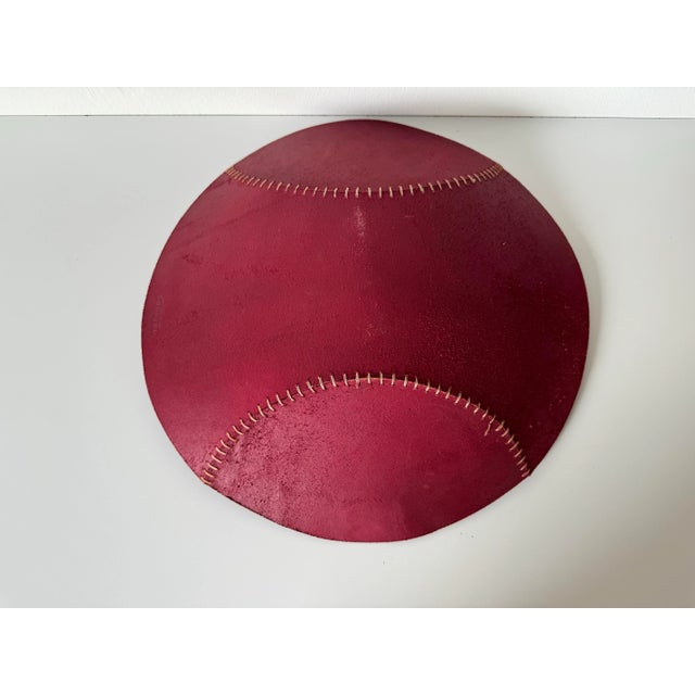 We offer for sale today this interesting Vintage baseball ball shape red leather bowl or dish by Antanna, S. Africa....