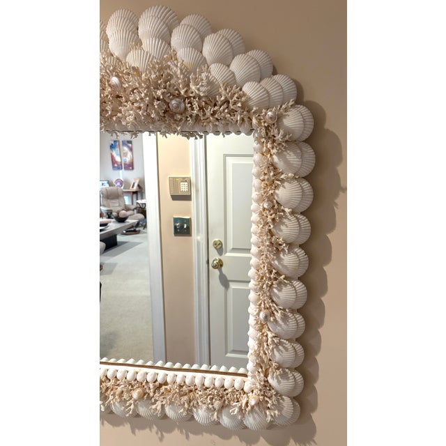 Incredible Large Vintage Handmade Coral and Scallop Shell Encrusted Wall Mirror. This intricately encrusted shell mirror...