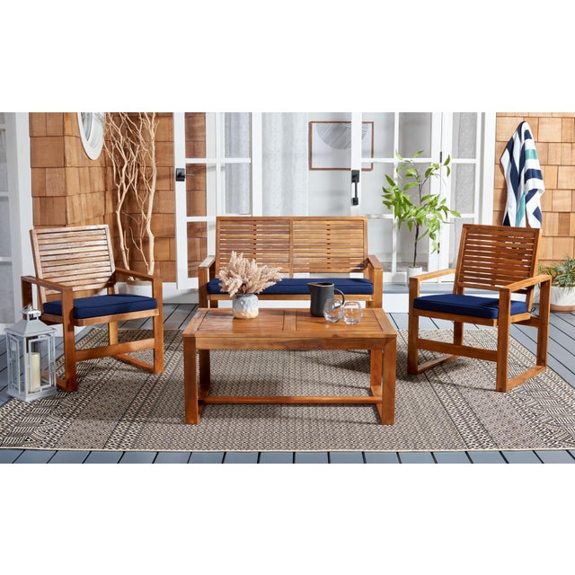 Give your outdoor spaces resort chic comfort and style year round with the rustic Ozark 4 piece outdoor set. Crafted of...