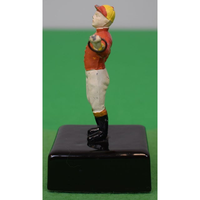 Jockey Sz: 3 1/2"H Overall w/ base Sz: 4 5/8"H *w/ slight paint loss* The 21 Club, often simply 21, was a traditional...