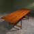 This extendable dining table was designed by carl heinz brockmann petersen and produced by louis g. Thiersen & son in...