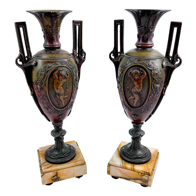 French Spelter Amphora Vases with Cherub Relief, 19th Century, Set of 2 For Sale