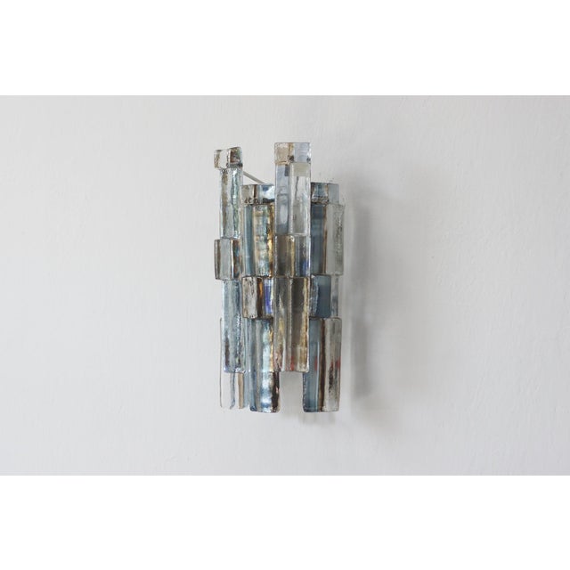 The sculptural Kalmar wall sconce, manufactured in Austria in the 1970s, is a perfect example of luxurious modernist...