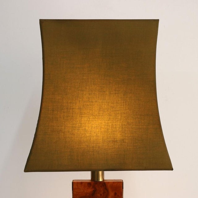 The lamp features a square-section column base crafted from beautiful elm burl. The rich, organic grain of the wood is...