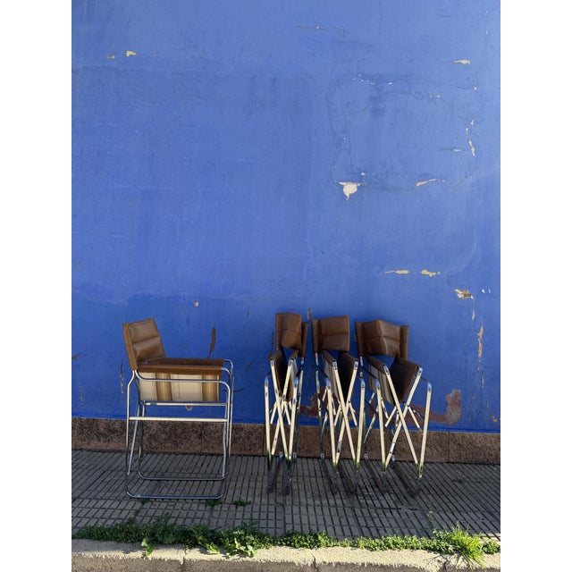 Set of 4 APRIL director-style chairs. Attributed to Gae Aulenti for the ZANOTTA company. The frames are unmarked and...