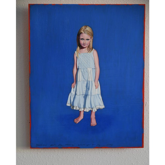 This artwork features a young girl standing confidently against a vibrant blue background, exuding a sense of wonder and...