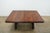 This vintage Theodore Alexander Revival Style extendable mahogany dining table is a substantial statement piece with a...