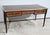 This medium flat desk, in solid and plated mahogany, opens with two side drawers of the same dimensions and a lower...