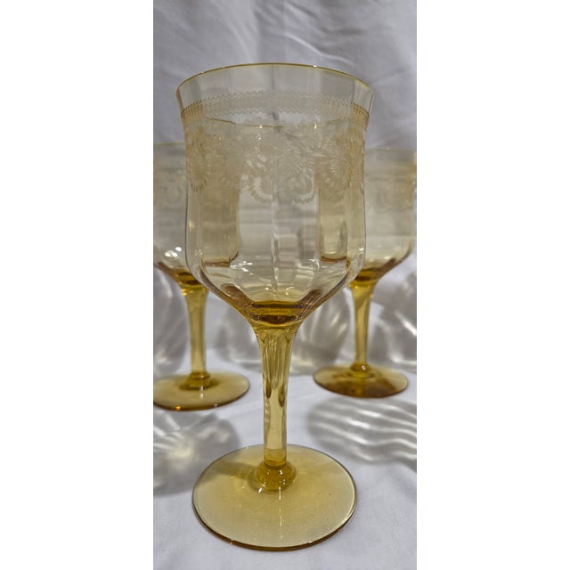 Add a cheerful pop of vintage color to your table with this beautiful set of five yellow Depression glass wine glasses....