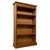 A charming vintage 20th-century English open bookcase, well crafted from pine and offering an attractive combination of...