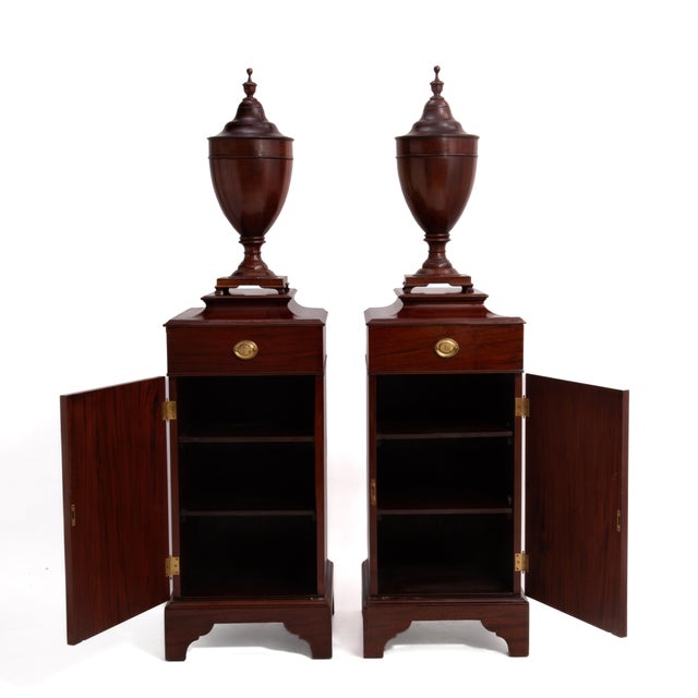 An exceptional pair of George III style knife boxes on pedestal cabinets made in the middle of the 20th Century. Dating in...