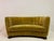 An early 20th century Danish curved sofa, likely dating to the 1930s, with an elegant and sculptural “banana” form. The...