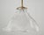 Vintage pendant light made of a clear Holophane style ruffled shade and a newly made brass pole fitter. This requires one...