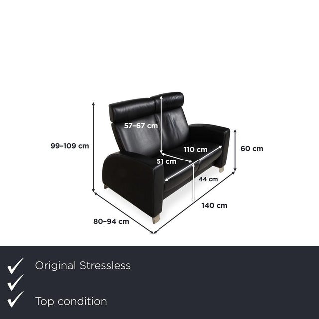 Here you get a two-seater sofa from the Stressless Arion series, which, with its black leather and compact design, adds a...