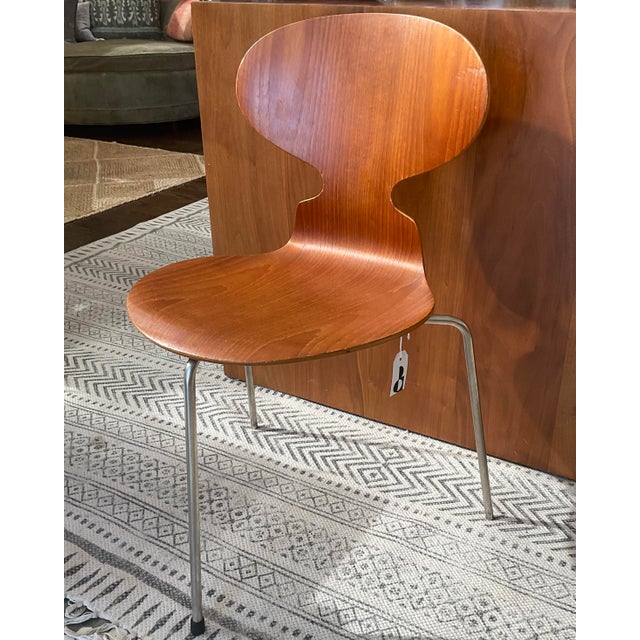 An early version of the iconic 3-legged chair from Fritz Hansen in Teak. In great condition! Model 3100 was designed by...