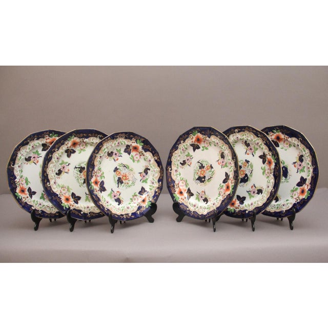 A decorative set of six 19th Century masons ironstone hand painted plates, with an Imari style design incorporating the...