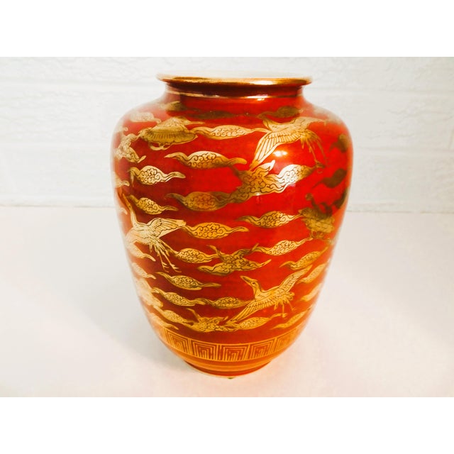 Very nice vase from Japan. Has a busy pattern of birds and a couple of different ships interwoven in the gold birds....