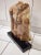This contemporary marble sculpture of a male torso stands at 24 inches tall, showcasing a sleek and modern figurative art...