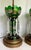 Here is a spectacular pair of late 19th-century emerald-green glass lusters, thoughtfully converted into dramatic table...