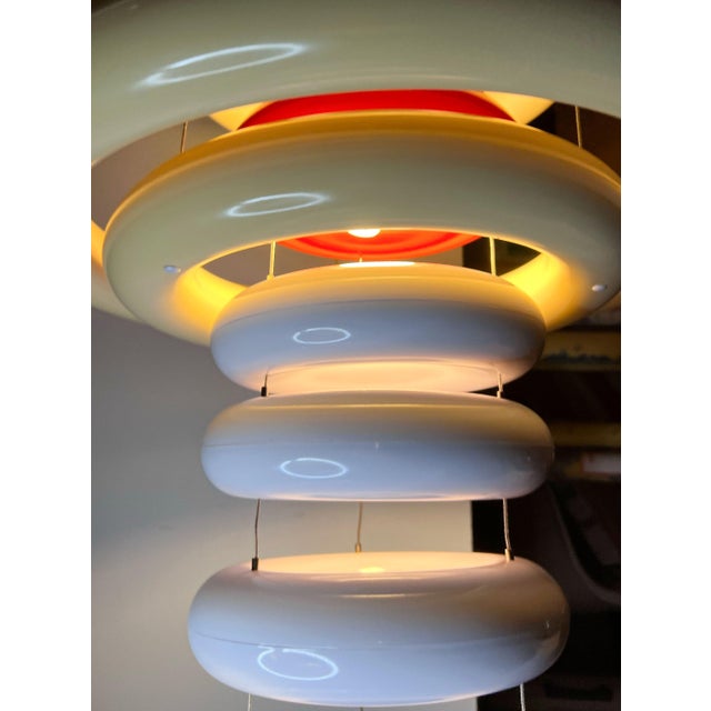 Verner Panton Verpan UFO chandelier, white, red,Chrome, Denmark, 1975, 2015. Originally designed in 1975, Panton’s iconic...