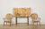 Midcentury set of four peacock or fan back dining armchairs made in the Hollywood Florida Regency taste. The chairs...