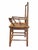 A beautifully crafted vintage Chinese hardwood armchair showcasing traditional Chinese design elements and exceptional...