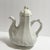 Elevate a breakfast table, open kitchen shelving, or a dining buffet with this exceptional mid-century three-piece white...