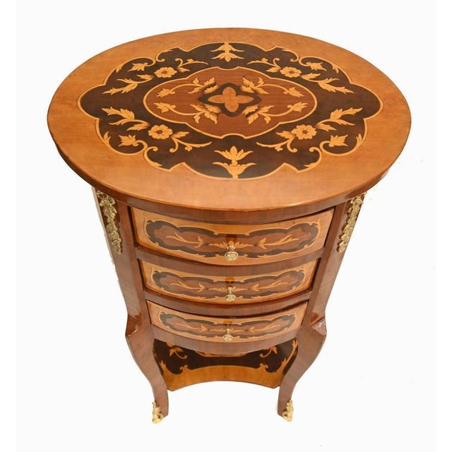 Charming pair of French bedside cabinets in the Louis XVI taste Elegant cylindrical form with gently bowed fronts...