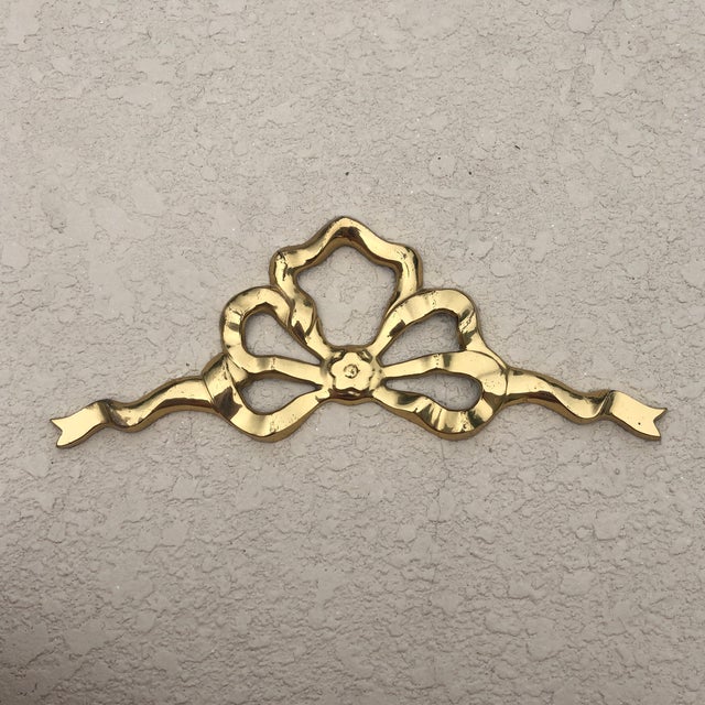 Found at an Estate in SW FL. Darling brass ribbon wall decor that would look so cute above a window or door or as wall...