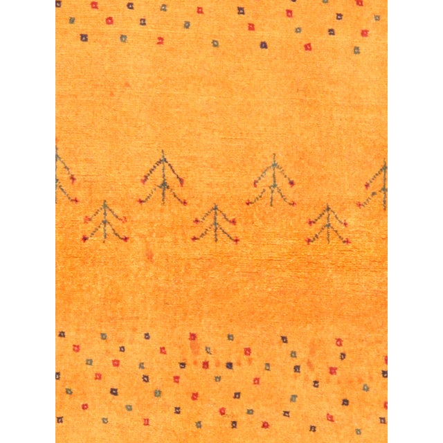 Tribal Hand-Knotted Area Rug is handmade with extra high pile and very simple, stylized designs. They are constructed from...