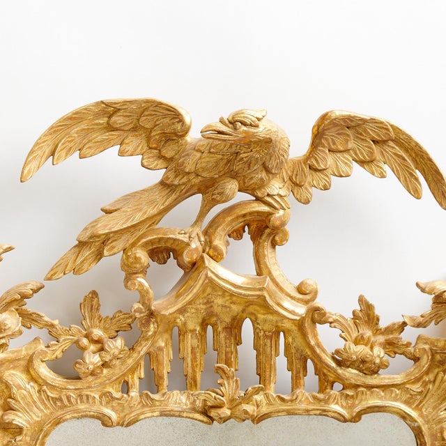 An exceptional pair of mid-18th century English George III giltwood pier mirrors, circa 1755, in the manner of celebrated...