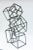 This monumental and arresting stacking cube welded steel sculpture has many angles and forms of cubes. Some are stacked at...