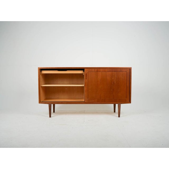Teak Sideboard by Poul Hundevad, 1960s, in Very Good conditions. Designed 1960 to 1969 This piece has an attribution mark,...