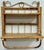 Vintage two-tier rattan wall shelf with drop down towel bar. Caned shelf surfaces add texture and character. Holes for...